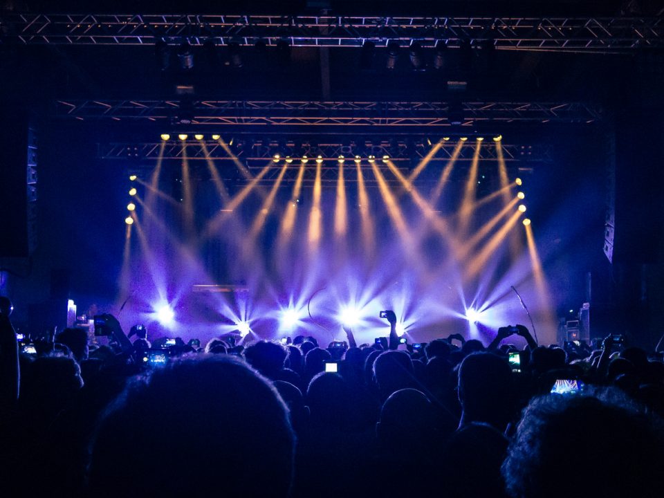 Concert crowd filming with their smartphones