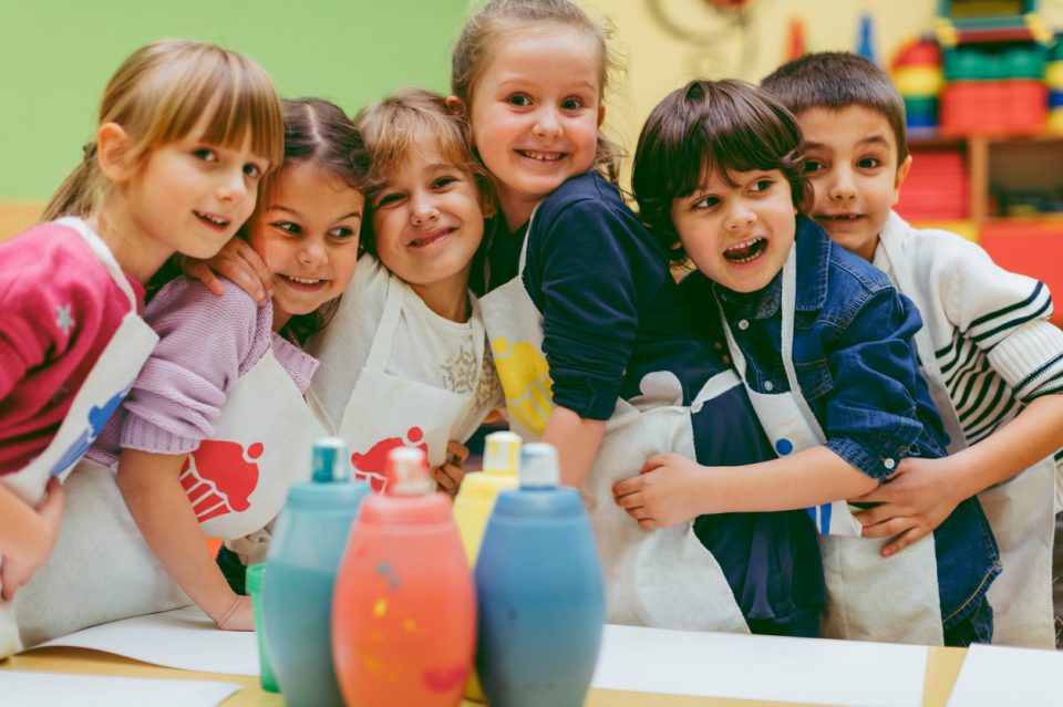 Children painting after they have gone back-to-school